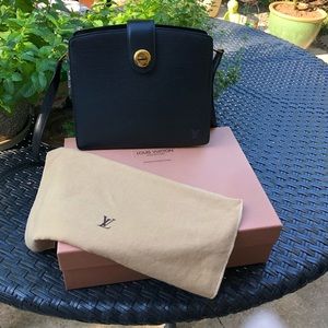 Black Epi leather handbag by Louis Vuitton